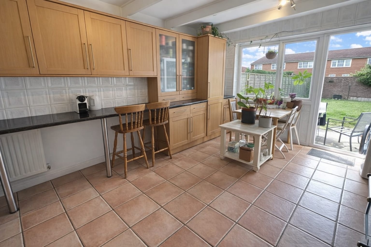 Kitchen — cleared and professionally lit — after